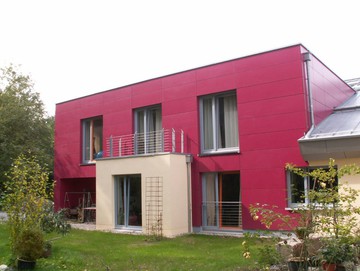 Mehrfamilienhaus mit Fassade aus Eternit